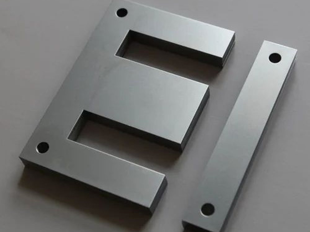 E and I profile transformer laminations with punched fixing holes